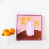 Pink Striped Vase With Yellow Flowers