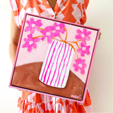 Pink Flowers In Stripey Pot